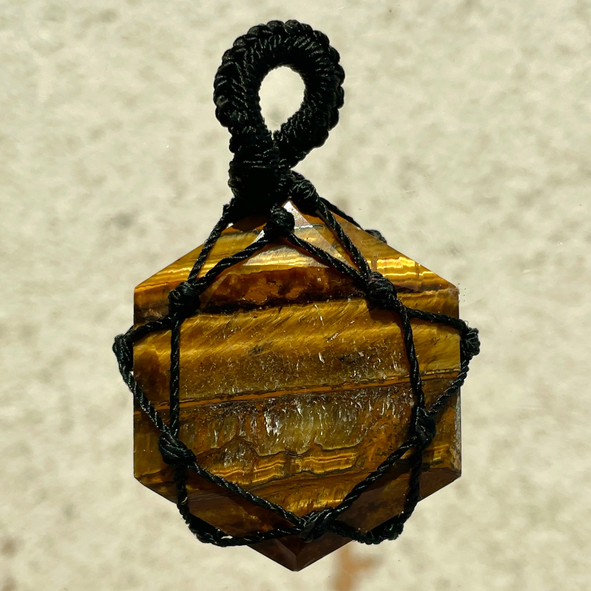 Tigers Eye - Macrame Wrapped Hexagonal Pendant Tigers Eye - Macrame Wrapped Hexagonal Pendant